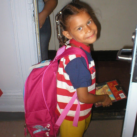 Give a gift that matters: a donation in your friend's name. This gift will provide a new backpack filled with back to school supplies for one child living in a