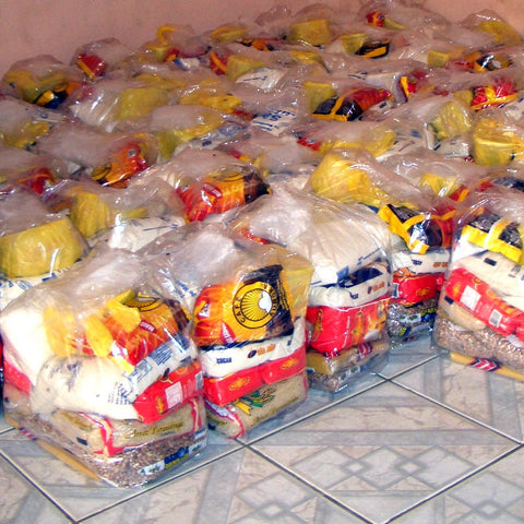 Give a gift that matters: a donation in your friend's name. One 40 lb bag of rice, beans, flour, tortillas, canned goods, etc. This bag of food is enough to me