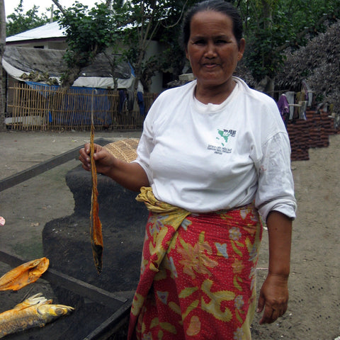 Give a gift that matters: a donation in your friend's name. With $98, a woman can start a paper maché business and find the strength to recover from a personal