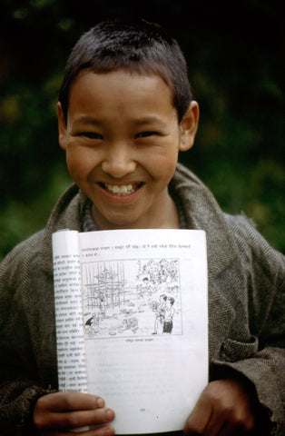 Give a gift that matters: a donation in your friend's name. Your gift will provide children with access to appropriate literature - often for the first time. B