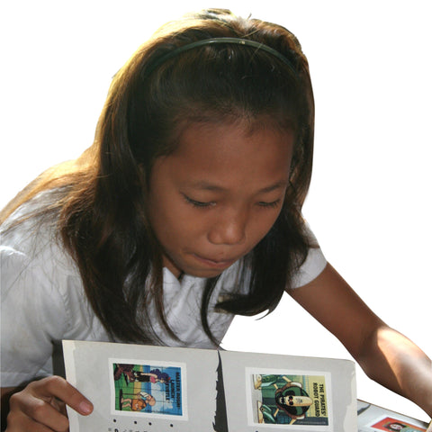 Give a gift that matters: a donation in your friend's name. Your gift will provide children with access to appropriate literature - often for the first time. B