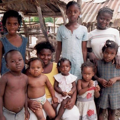 Give a gift that matters: a donation in your friend's name. With a $100 loan, a Haitian woman can rent a market stall and increase her income two-fold. And you